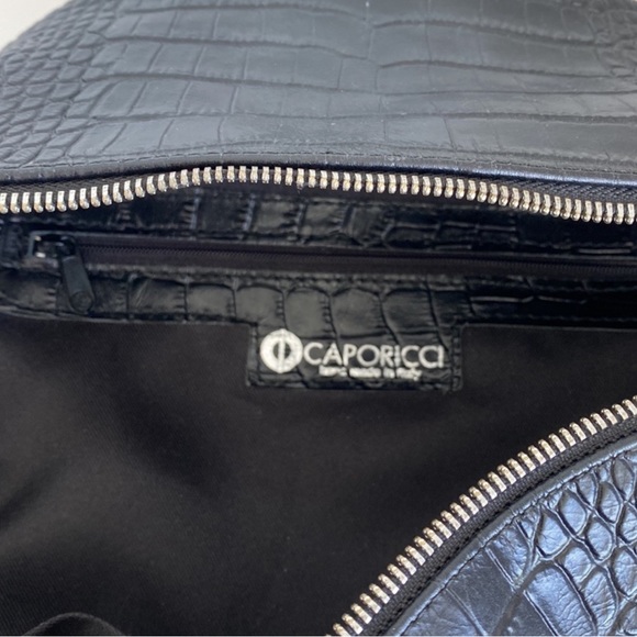 Embossed aligator leather backpack